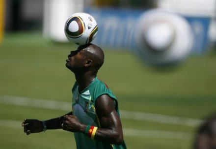 Cameroon's national soccer team player Achille Emana Edzimbi controls the ball during a training session for the upcoming FIFA World Cup
